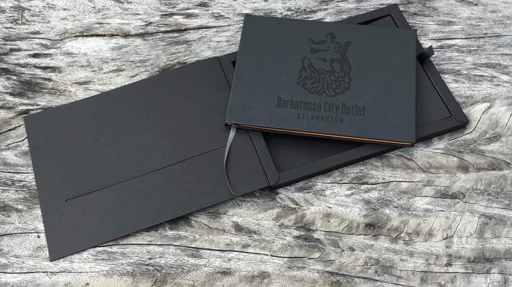 Marketing Book - Barbarossa City Outlet Gelnhausen - book and case