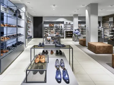Shoe departments (men & women) at a department store - redesign - CJ Schmidt Husum - men area and fitting zone