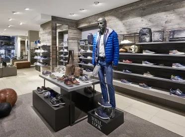 Shoe departments (men & women) at a department store - redesign - CJ Schmidt Husum - men area and view in store
