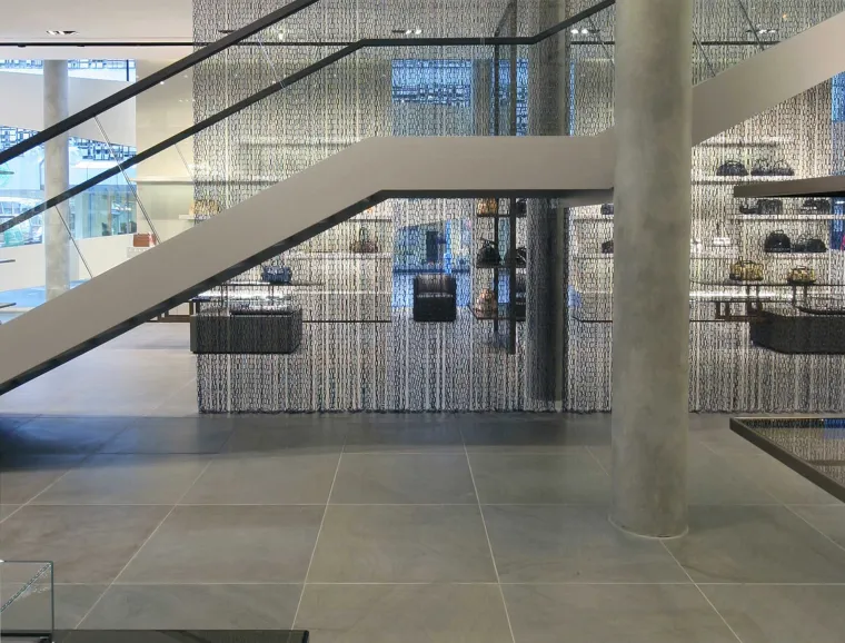 accessories store - New construction - engelhorn - engelhorn acc/es Mannheim - semipermeable dark metal chain curtain - staircase