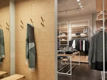 women’s and men’s fashion departments - reconstruction - redesign - Ganzbeck Neuötting - fitting room view - cork wall