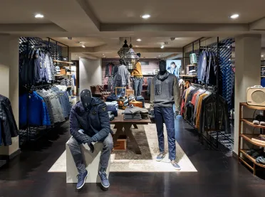 women’s and men’s fashion departments - reconstruction - redesign - Ganzbeck Neuötting - mens department - store overview
