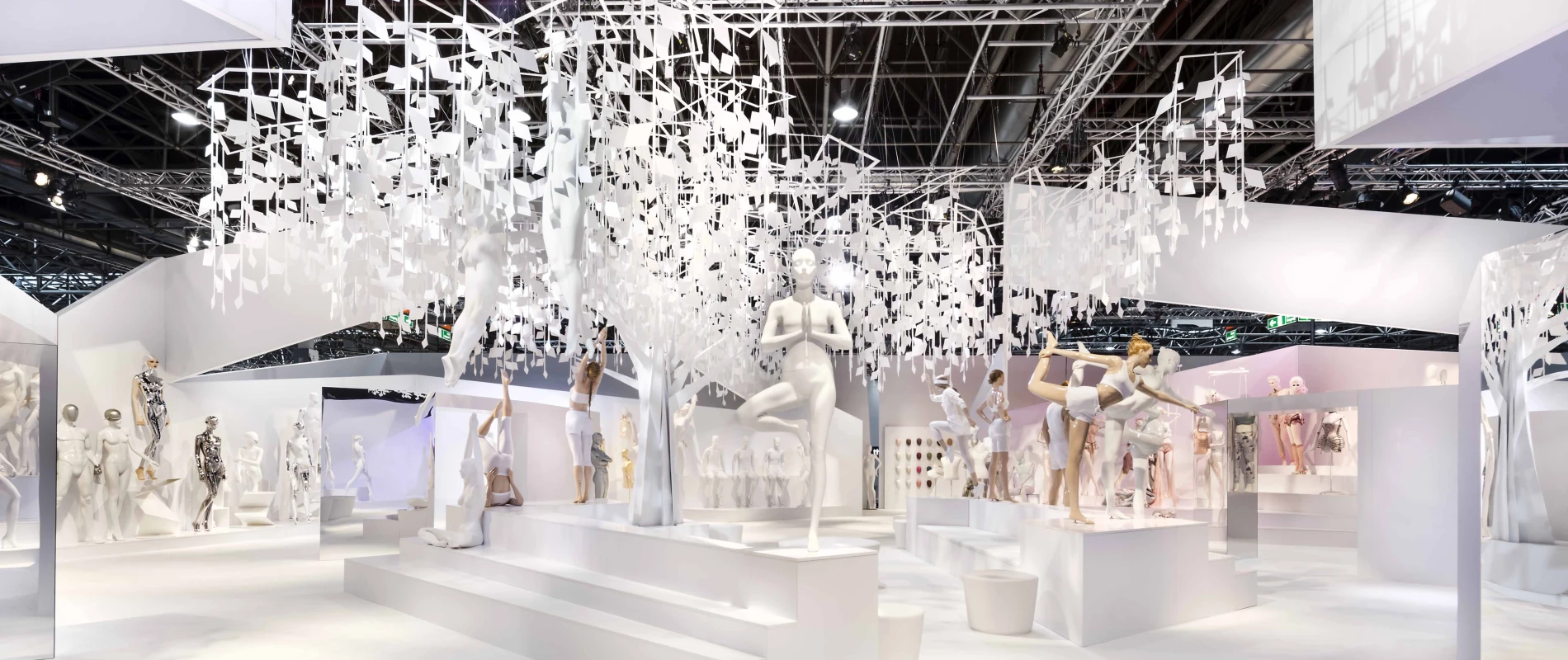 Trade fair booth at Euroshop - Genesis Euroshop Düsseldorf - stand overview wide angle - ceiling with hanging tree installation