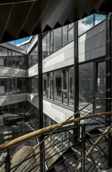Conversion of a warehouse into an office/administration building - Hoffmann Group Munich - stairwell