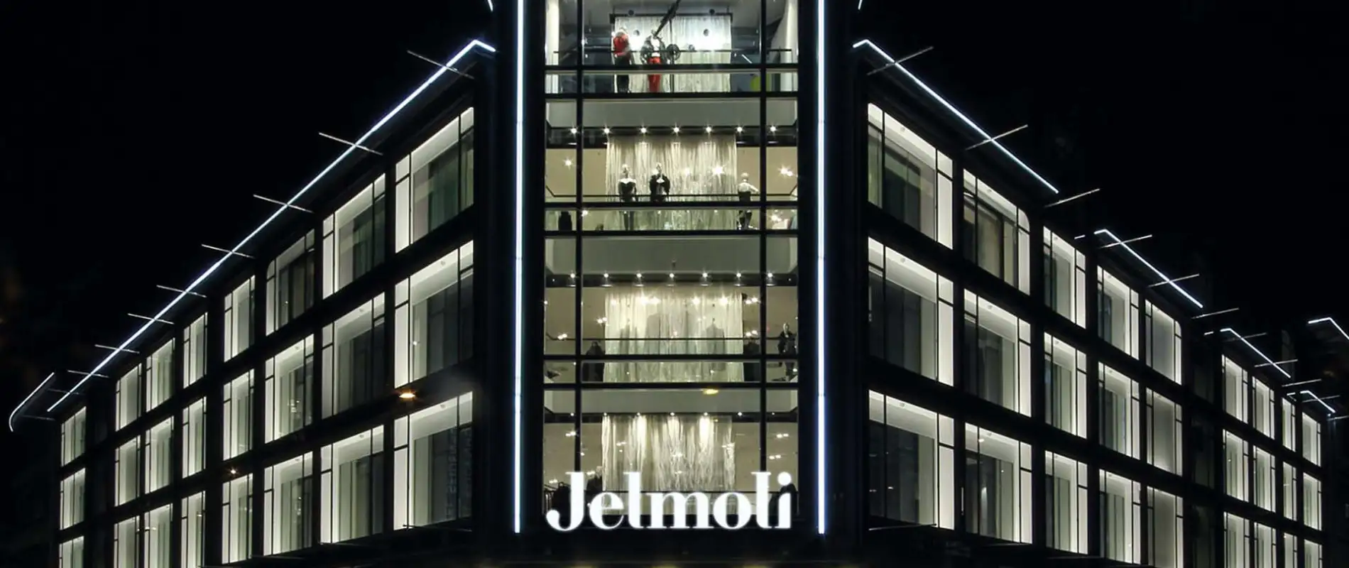new structuring of the sales area - modern development concept - department store - Jelmoli Zurich - building facade enlighted by night