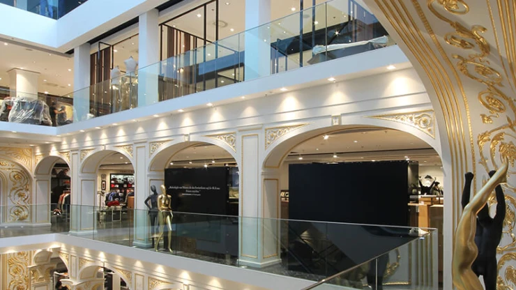 fashion department store - Redesign and new conception - expansion of retail floor space - Kastner & Öhler Graz - view into atrium - gold stucco - elegant details