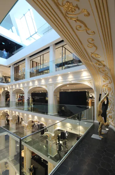 fashion department store - Redesign and new conception - expansion of retail floor space - Kastner & Öhler Graz - view into atrium - gold stucco - elegant details