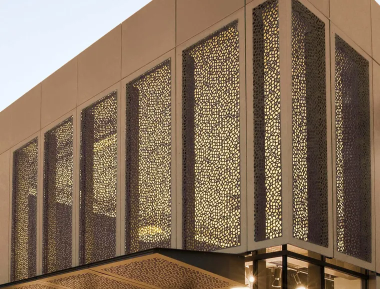 Outletcity - construction and conversion of an existing building -  perforated façade panels