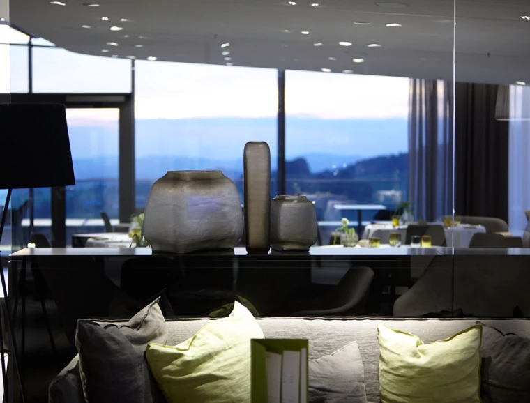 gourmet restaurant - new construction - Restaurant Johanns Waldkirchen - interior detail - lounge chair - vases - panorama windows