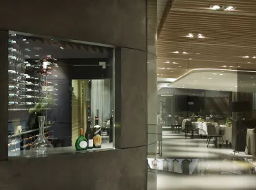 gourmet restaurant - new construction - Restaurant Johanns Waldkirchen - winery - wine reck - look-through - entry - glass wall