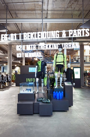 bike shop - flagship store - new construction and reconstruction - Rose Biketown Bocholt - gear display spot - illuminated lettering