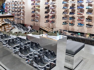 sports store - interior redesign - SportScheck Nuremberg - sports shoe area - shoe display wall