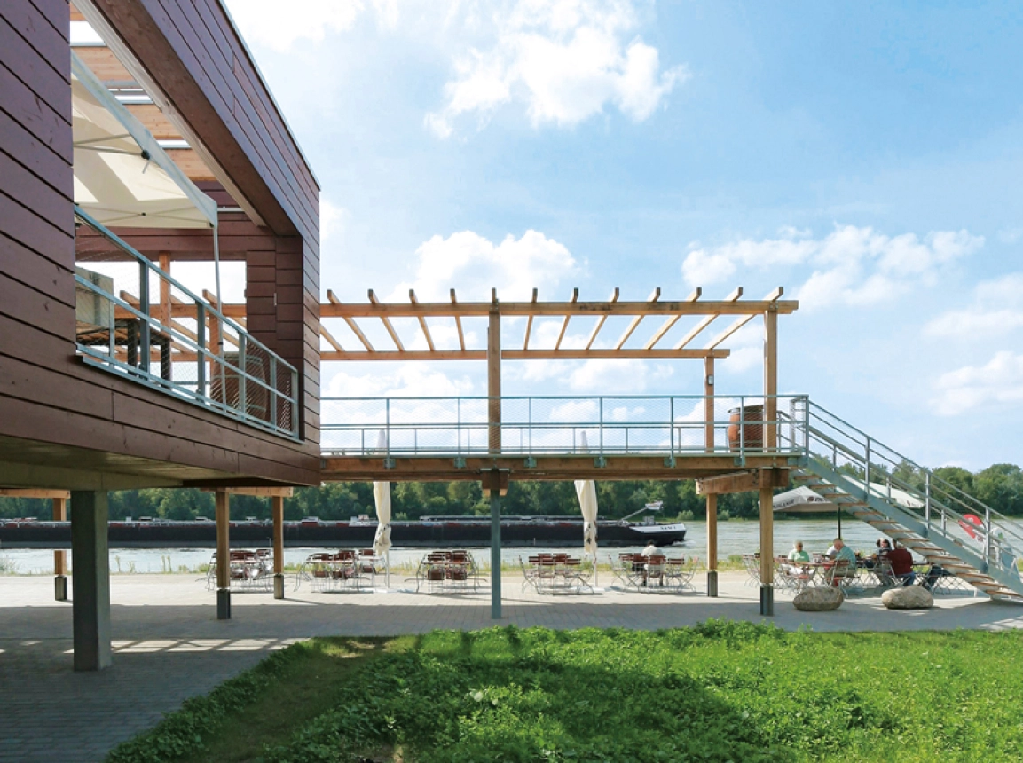gastronomy building - construction - green building standards - competition - Strandbad Mannheim -  outside staircase - wooden stilt pavillion - view towards river