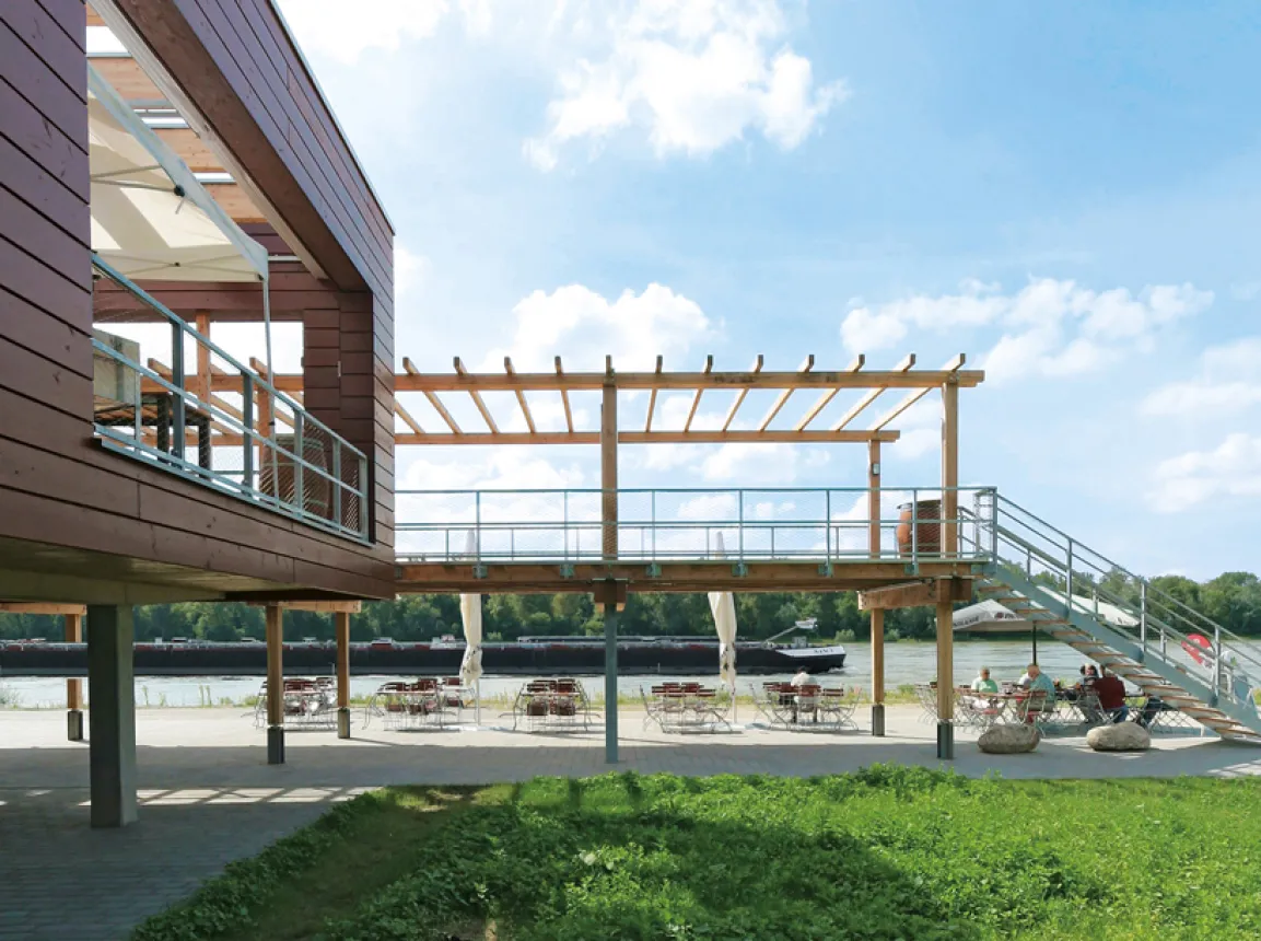 gastronomy building - construction - green building standards - competition - Strandbad Mannheim -  outside staircase - wooden stilt pavillion - view towards river